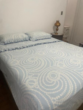Quarto em Apartamento